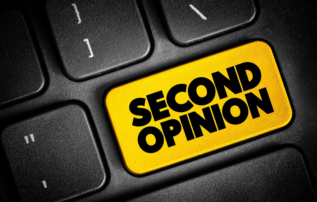 A yellow keyboard key that reads Second Opinion